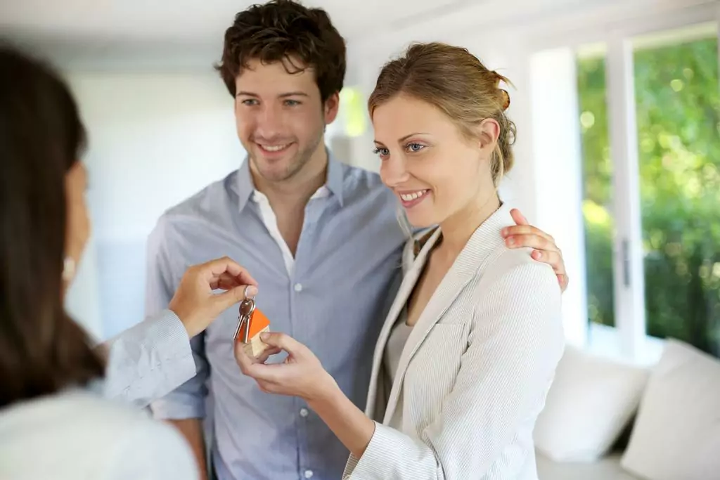 A young couple buying their first home.