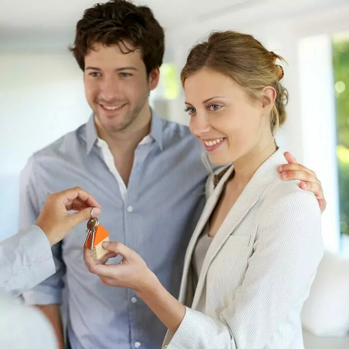 A young couple buying their first home.